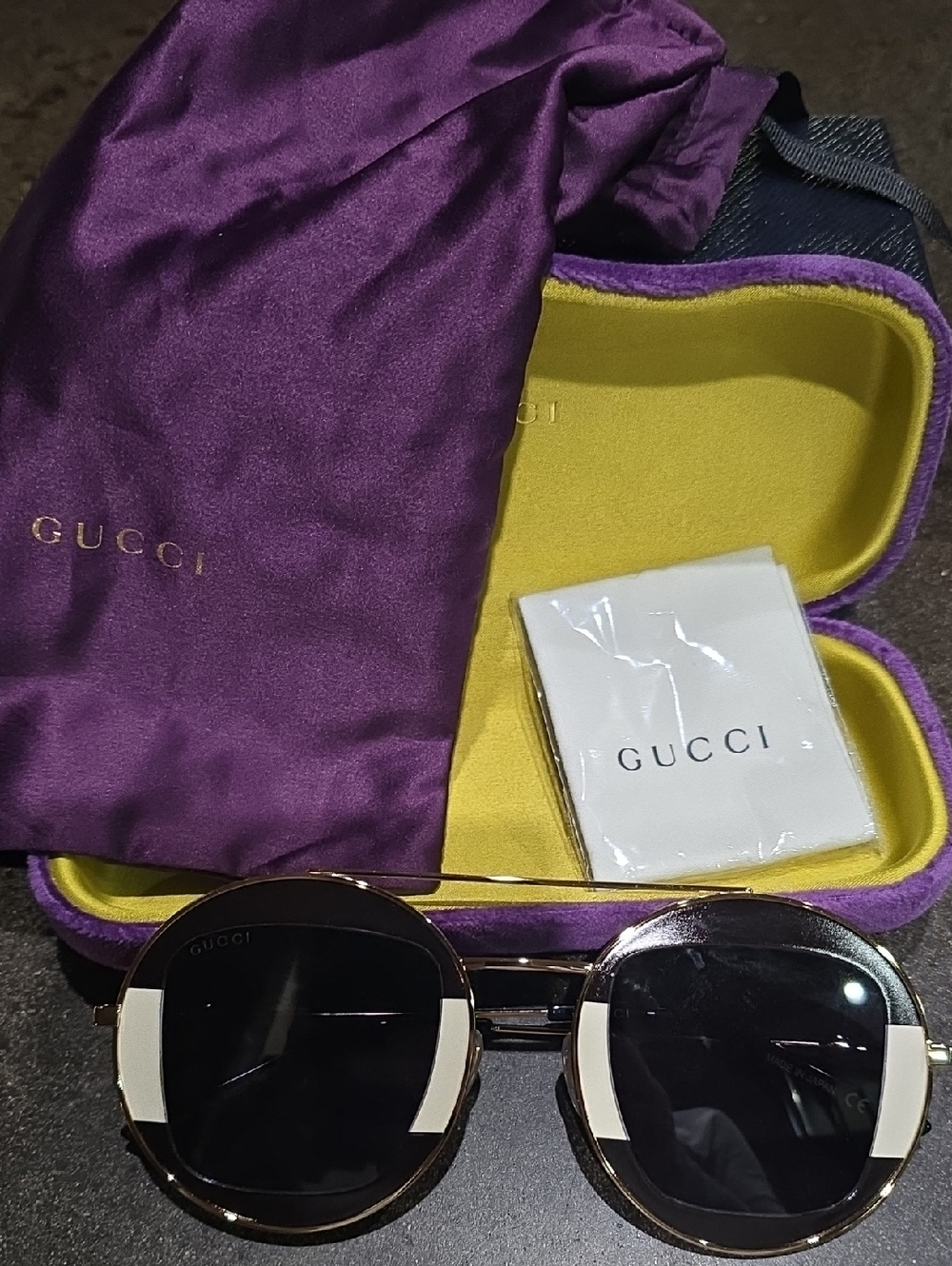 Gucci Black and Gold Round Sunglasses with Purple Dust Bag